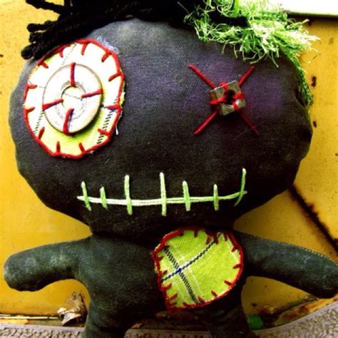 The Sacred Symbols and Rituals Associated with Sinister Shrine Voodoo Dolls